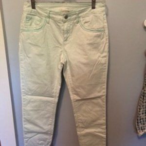Pale aqua skinny leg jeans.